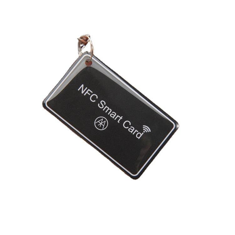 Æstetiske RFID-tags med specialform og glat epoxybelægning beregnet til moderne adgangskontrolsystemer i virksomheder.